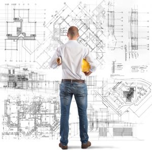 Architect looks at projects of a building